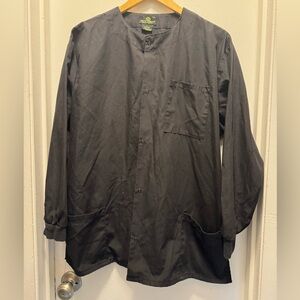 Natural uniforms lab coat size Large. Snap closure. Good cuff elastic.